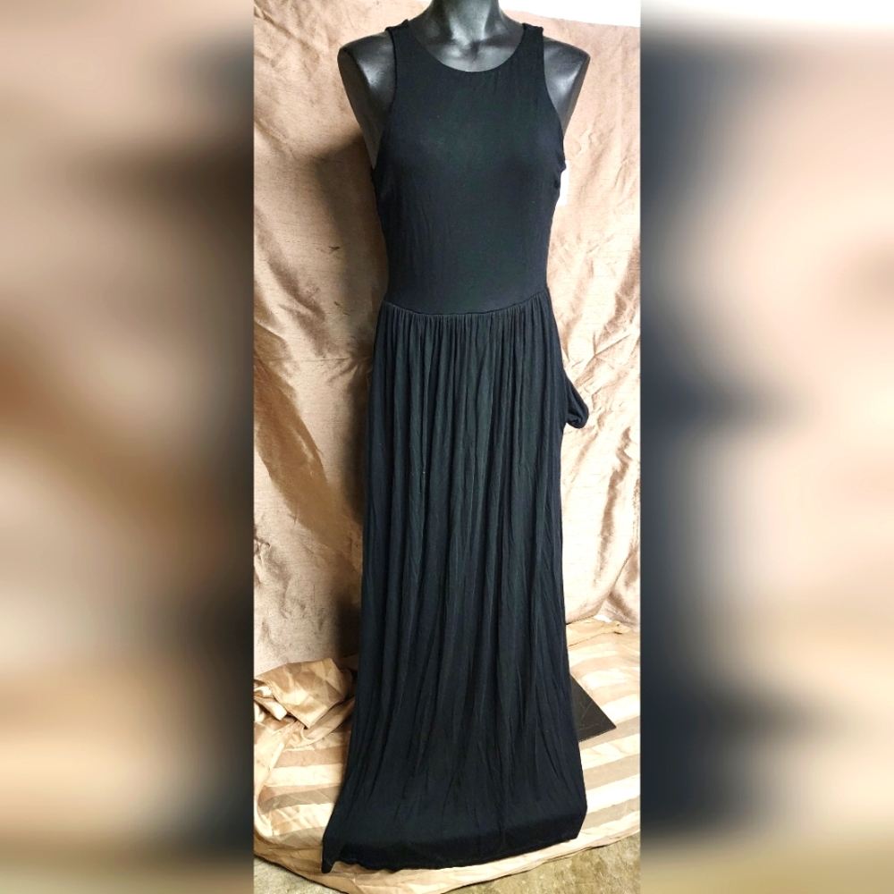Stillettos black maxi dress. Pockets.  Sz Med.  New